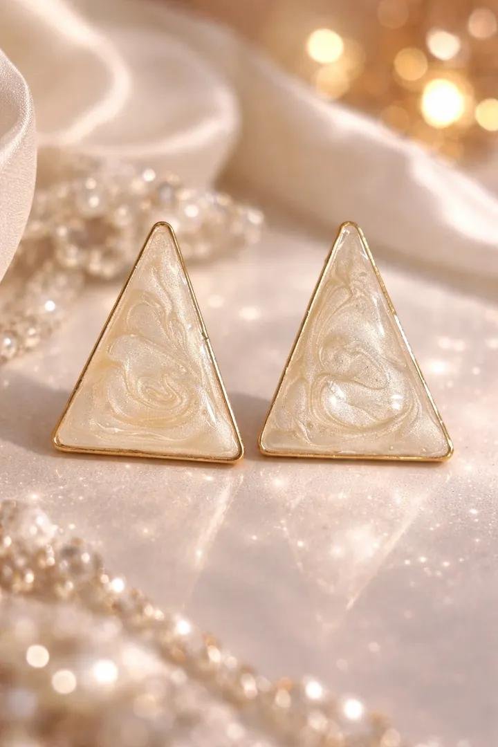What Makes Marble Gold Triangle Studs a Must-Have Trend